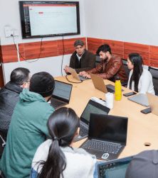 Team members from a software development organization collaborating on agile solutions.